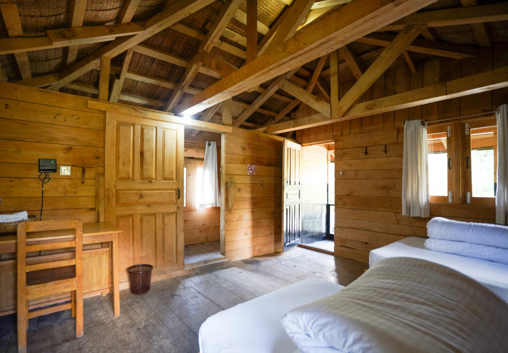 Scenic view of Kalsee Eco Lodge surrounded by lush greenery and Himalayan landscape in Nepal